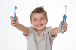 Kid and toothbrush