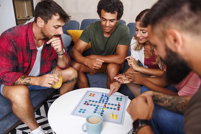 Group playing a board game
