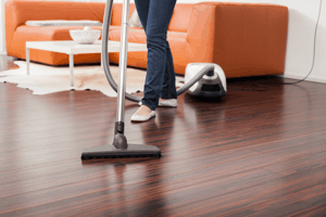 vacuuming wooden floor